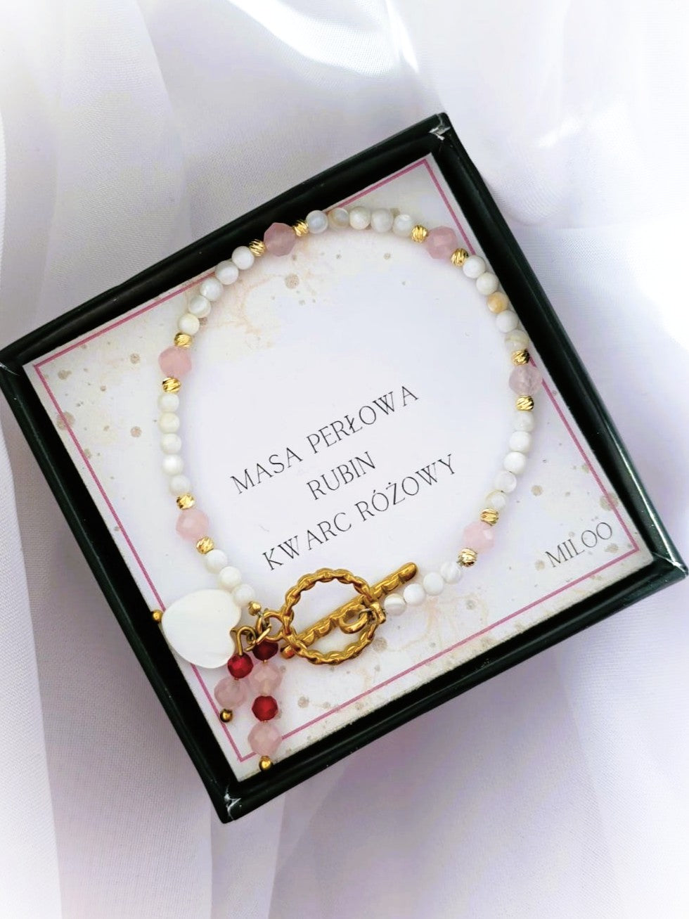 Bransoletka z kwarcem, rubinem i masą perłową